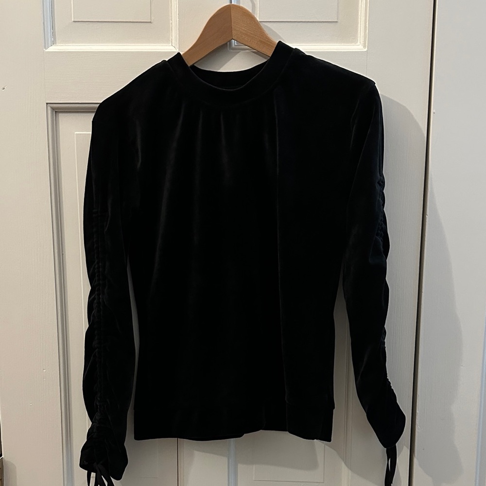 Black velvet, dressy top with adjustable sleeves ties at the end